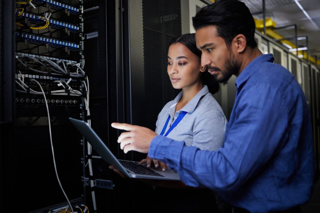 people-maintenance-or-laptop-in-server-room-it-e-2023-11-27-04-53-18-utc